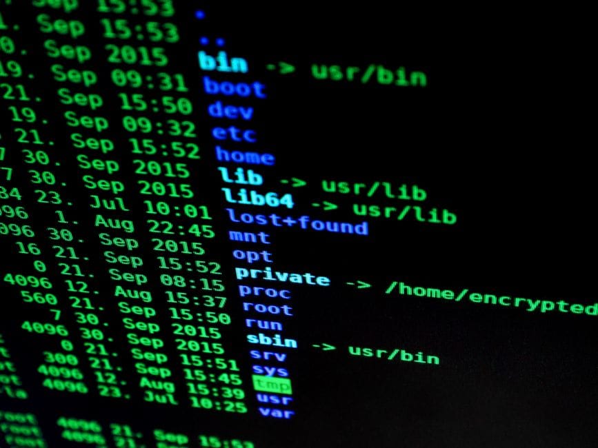 How to Compress a PDF Without Losing Quality Close-up of colorful text on a computer screen, showcasing cybersecurity concepts.